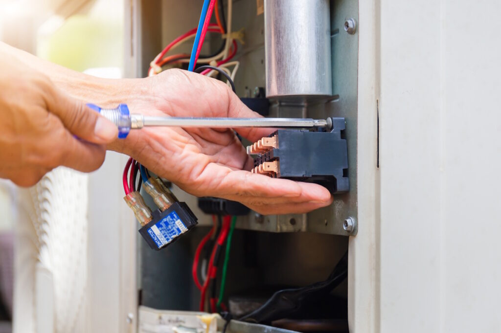 close up of furnace repair work